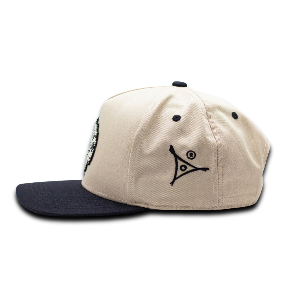 GORRA ARENA NEGRO/ | CABEZA DE QUETZAL - Huari MX